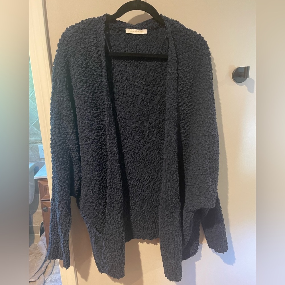Open front sweater. Pookie and Sebastian